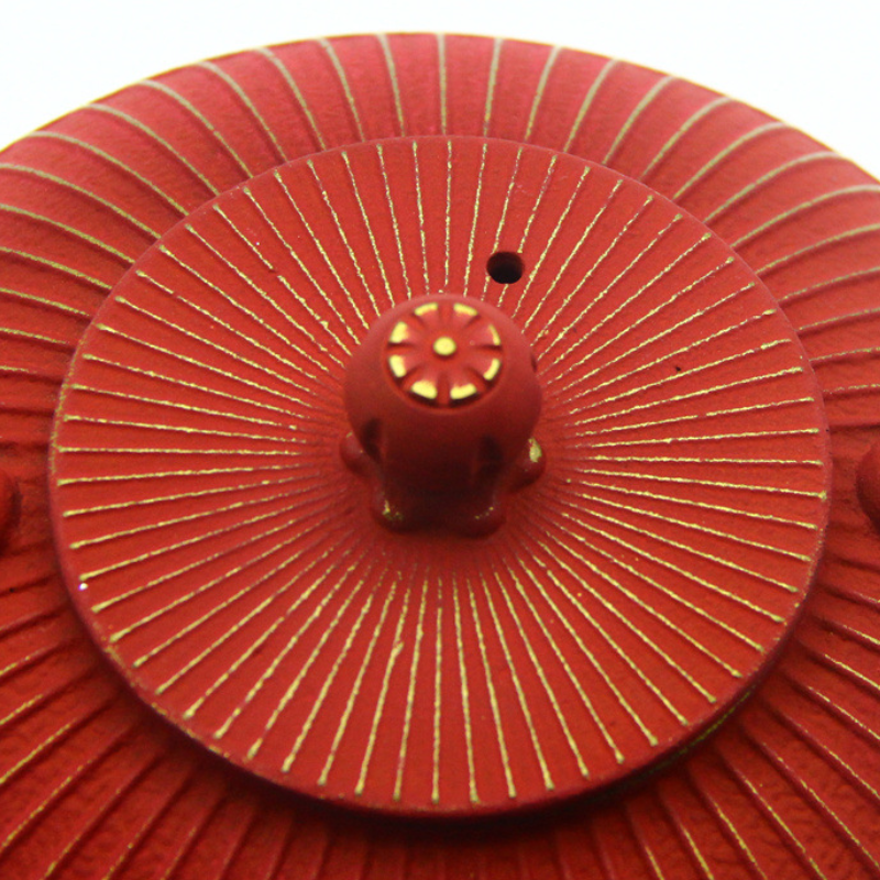 Théière rouge or japonaise en fonte